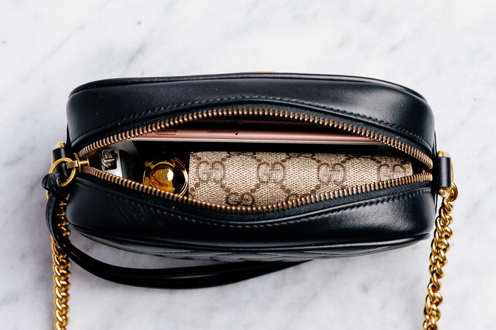 Reference image illustrating What Fits Inside the Gucci GG Marmont Mini Matelassé Camera Bag: A Real-Life Packing Test