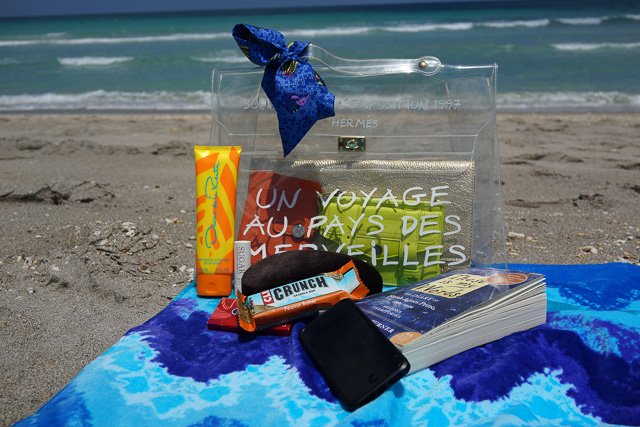 Reference image illustrating What’s Inside a Hermès Kelly Beach Bag: Summer Essentials for the Fashion-Forward