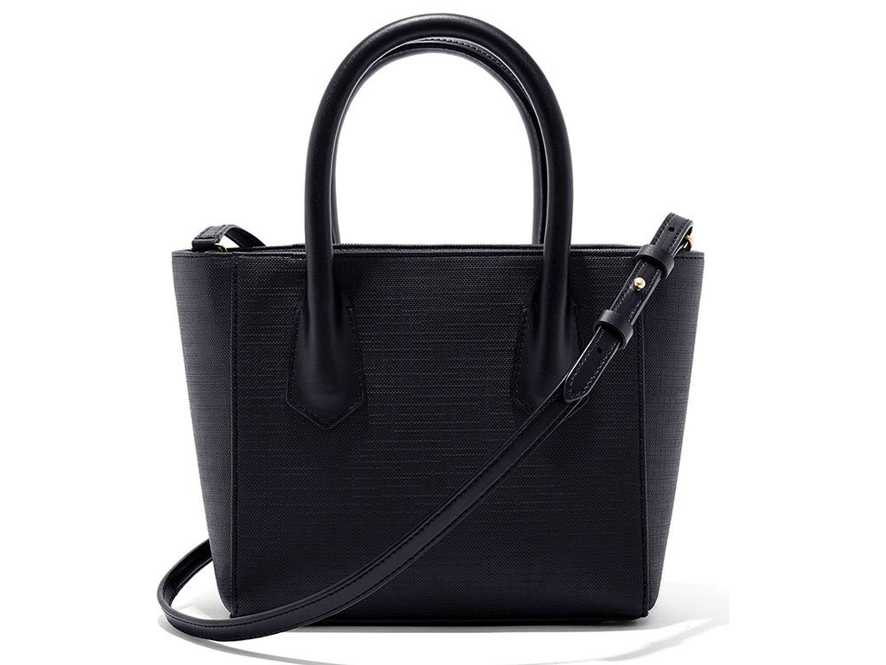 Reference image illustrating Why the Dagne Dover Petite Signature Tote Remains a Favorite After Two Years of Daily Use