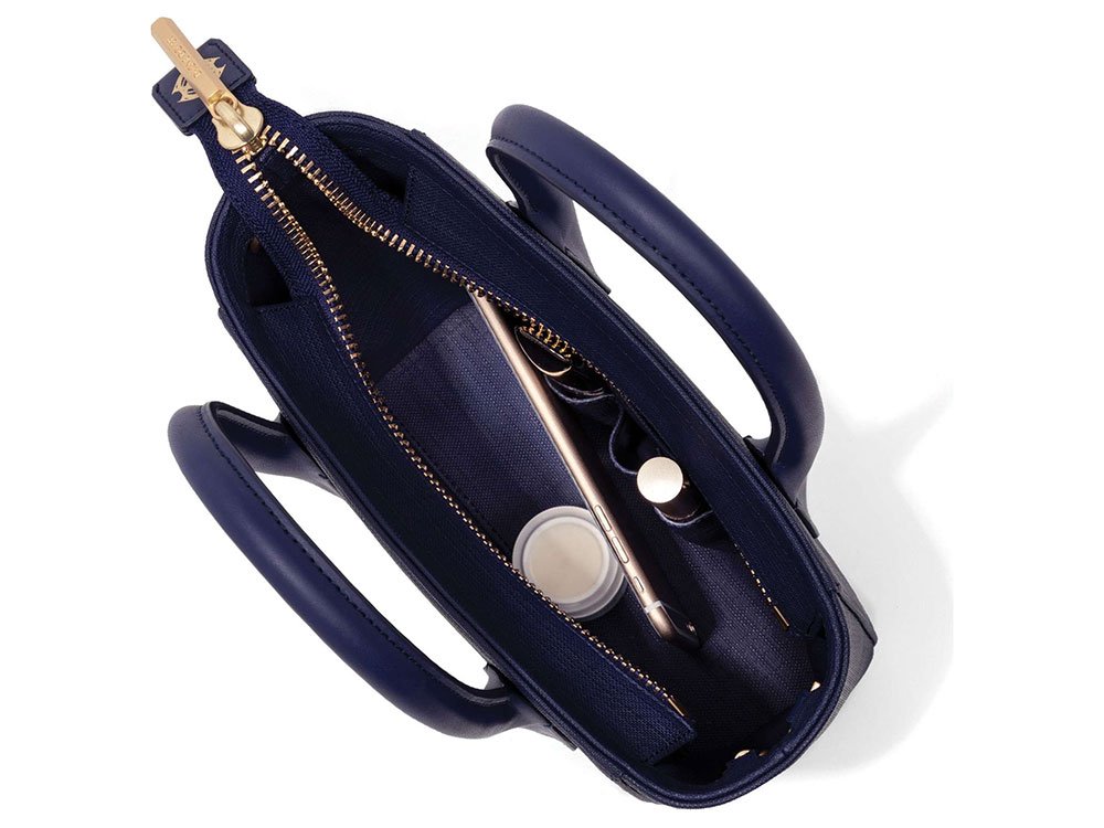 Reference image illustrating Why the Dagne Dover Petite Signature Tote Remains a Favorite After Two Years of Daily Use
