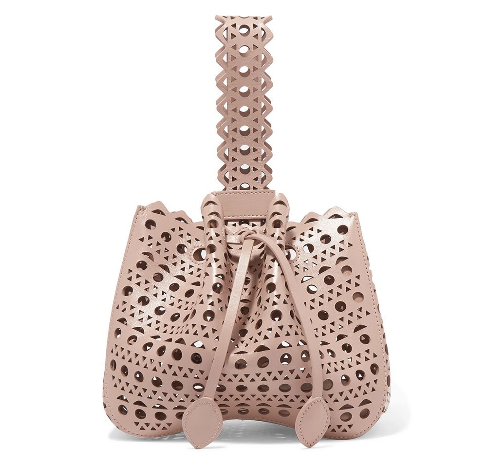 Reference image illustrating Why Top-Strap Clutches Are the Indie Handbag Trend You Need to Know
