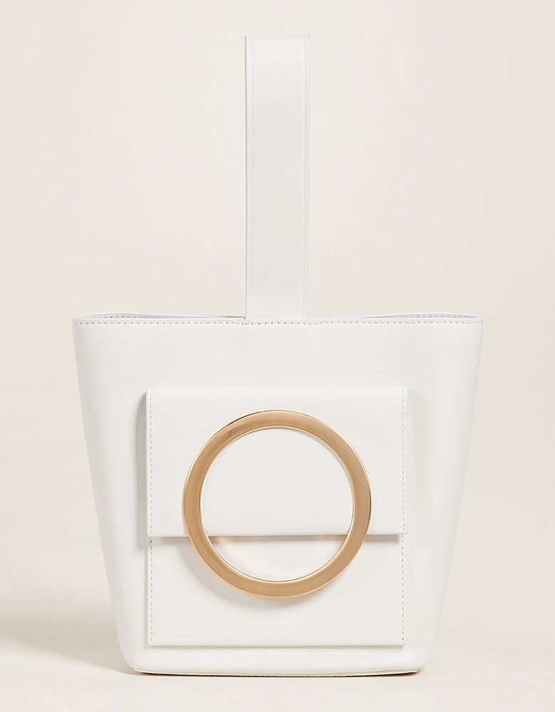Reference image illustrating Why Top-Strap Clutches Are the Indie Handbag Trend You Need to Know