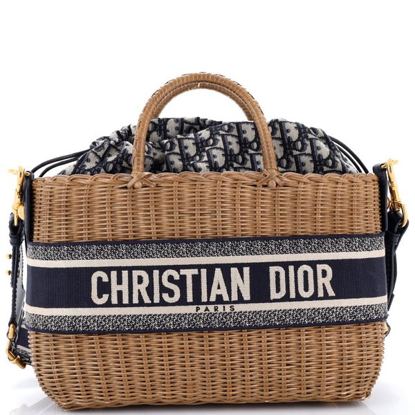 Reference image illustrating Christian Dior Basket Bag Wicker and Oblique Canvas Large: A Timeless Summer Icon