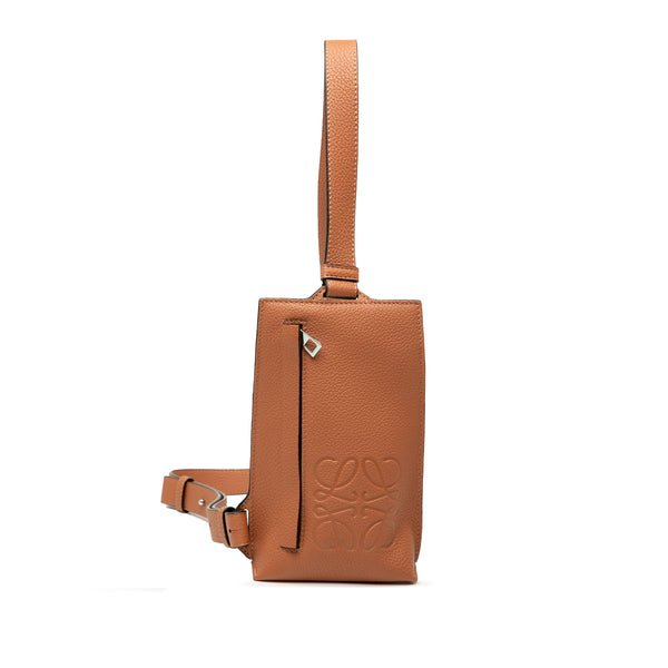 Reference image illustrating Loewe Vertical T Pocket Body Bag Leather: A Compact Icon of Spanish Craftsmanship