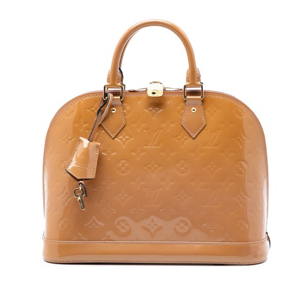 Reference image illustrating Louis Vuitton Alma Handbag Monogram Vernis PM: A Timeless Icon Revisited