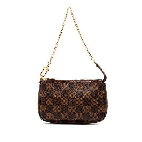 Reference image illustrating Pochette Accessoires Damier Mini: A Compact Icon from Louis Vuitton
