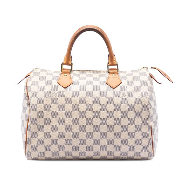 Reference image illustrating Louis Vuitton Speedy Handbag Damier 30: A Timeless Icon of Luxury and Craftsmanship